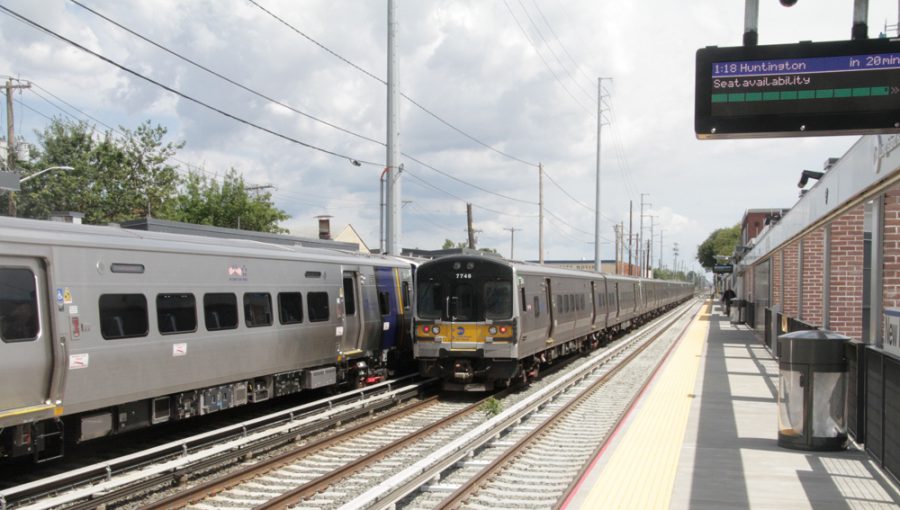 LIRR train of bi-levels on the middle track on the 1st day of 3rd track operation.